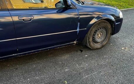 Mazda Familia, 2000 год, 190 000 рублей, 2 фотография