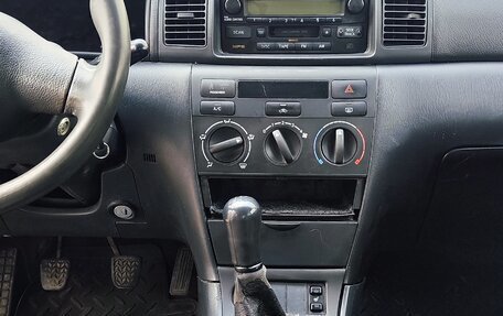 Toyota Corolla, 2004 год, 300 000 рублей, 8 фотография