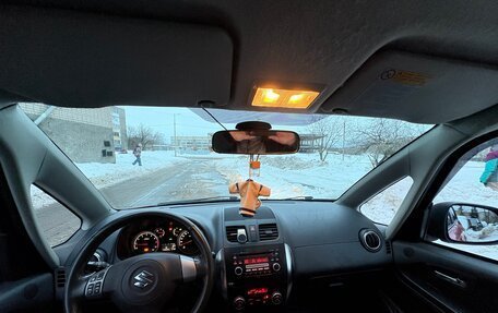 Suzuki SX4 II рестайлинг, 2009 год, 850 000 рублей, 23 фотография