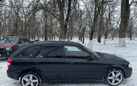 Mazda Familia, 1998 год, 220 000 рублей, 9 фотография