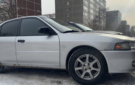 Mitsubishi Mirage VI рестайлинг, 2000 год, 280 000 рублей, 9 фотография