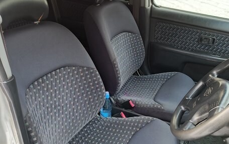 Nissan Cube II, 1999 год, 210 000 рублей, 11 фотография