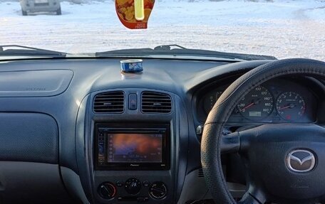 Mazda Familia, 2001 год, 330 000 рублей, 13 фотография