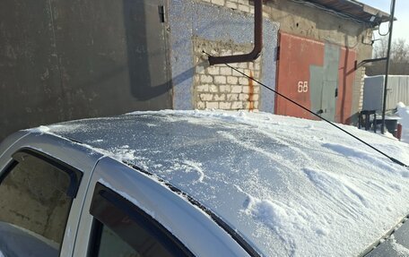 Renault Logan I, 2012 год, 205 000 рублей, 6 фотография