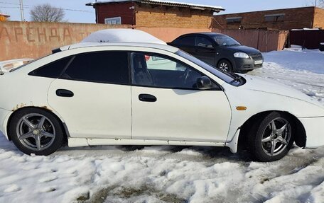 Mazda 323, 1996 год, 300 000 рублей, 3 фотография