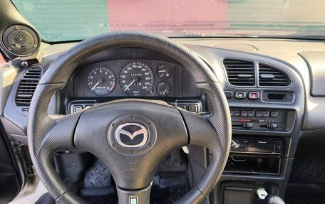 Mazda 323, 1996 год, 300 000 рублей, 10 фотография