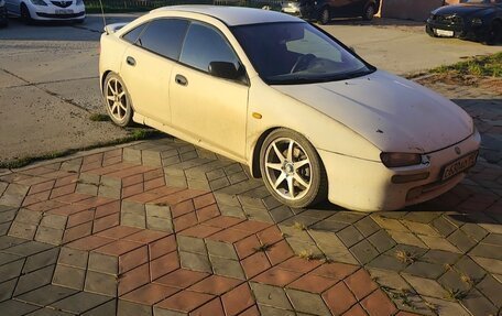 Mazda 323, 1996 год, 300 000 рублей, 13 фотография