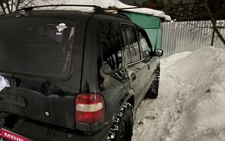 KIA Sportage IV рестайлинг, 1998 год, 1 фотография