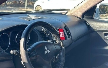 Mitsubishi Outlander III рестайлинг 3, 2010 год, 1 200 000 рублей, 14 фотография