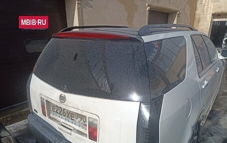 Cadillac SRX II рестайлинг, 2009 год, 400 000 рублей, 5 фотография