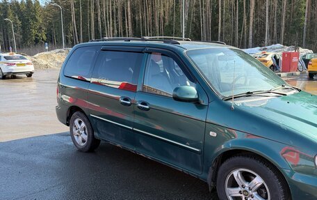 KIA Carnival III, 2004 год, 390 000 рублей, 2 фотография