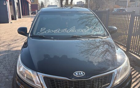 KIA Rio III рестайлинг, 2012 год, 700 000 рублей, 2 фотография