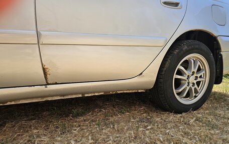 Toyota Avensis III рестайлинг, 2002 год, 420 000 рублей, 13 фотография