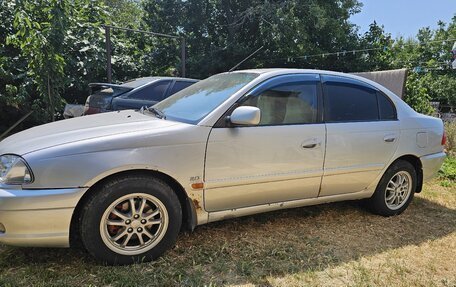 Toyota Avensis III рестайлинг, 2002 год, 420 000 рублей, 18 фотография