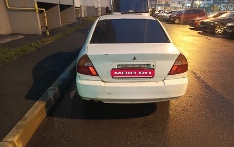 Mitsubishi Mirage VI рестайлинг, 2001 год, 100 000 рублей, 3 фотография