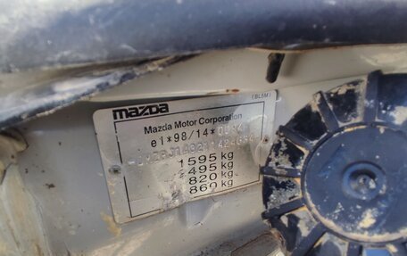 Mazda 323, 2001 год, 210 000 рублей, 23 фотография