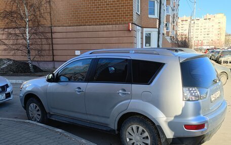 Mitsubishi Outlander III рестайлинг 3, 2009 год, 910 000 рублей, 2 фотография