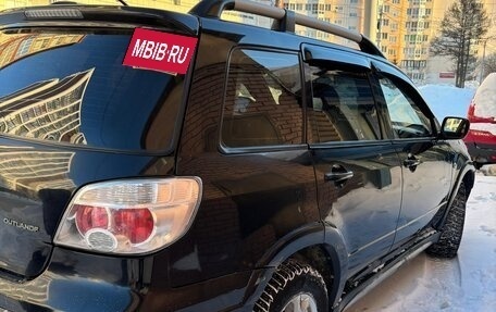 Mitsubishi Outlander III рестайлинг 3, 2007 год, 600 000 рублей, 2 фотография