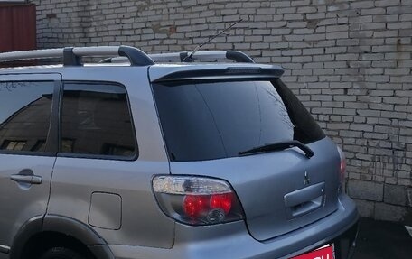 Mitsubishi Outlander III рестайлинг 3, 2004 год, 800 000 рублей, 10 фотография