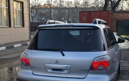 Mitsubishi Outlander III рестайлинг 3, 2004 год, 800 000 рублей, 13 фотография