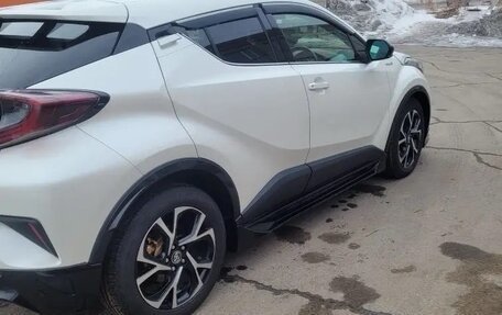 Toyota C-HR I рестайлинг, 2017 год, 2 200 000 рублей, 8 фотография