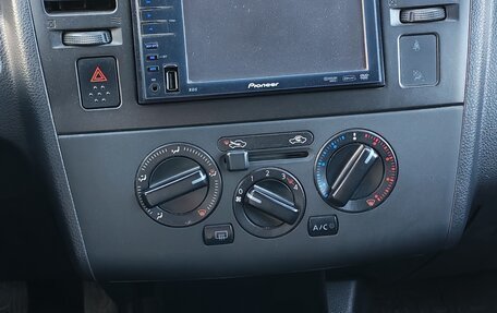 Nissan Tiida, 2010 год, 700 000 рублей, 4 фотография