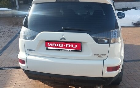 Mitsubishi Outlander III рестайлинг 3, 2011 год, 900 000 рублей, 4 фотография