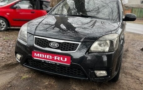 KIA Rio II, 2010 год, 666 000 рублей, 6 фотография