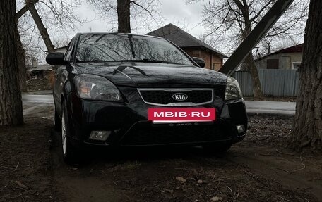 KIA Rio II, 2010 год, 666 000 рублей, 9 фотография