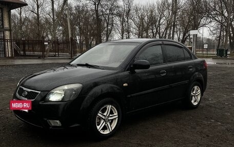 KIA Rio II, 2010 год, 666 000 рублей, 10 фотография