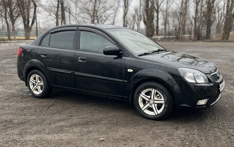 KIA Rio II, 2010 год, 666 000 рублей, 12 фотография