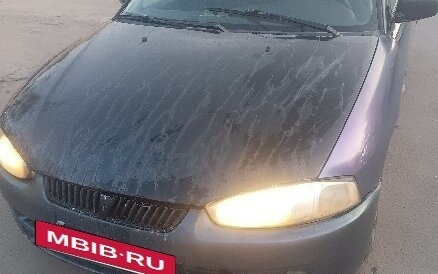 Mitsubishi Mirage VI рестайлинг, 2001 год, 80 000 рублей, 10 фотография