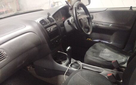 Mazda Familia Y10, 1998 год, 180 000 рублей, 7 фотография