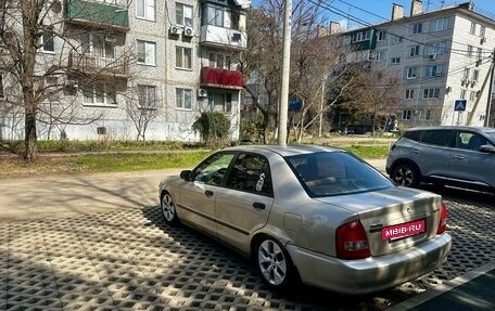 Mazda Protege, 2000 год, 165 000 рублей, 8 фотография