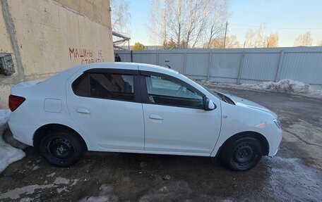 Renault Logan II, 2021 год, 700 000 рублей, 2 фотография