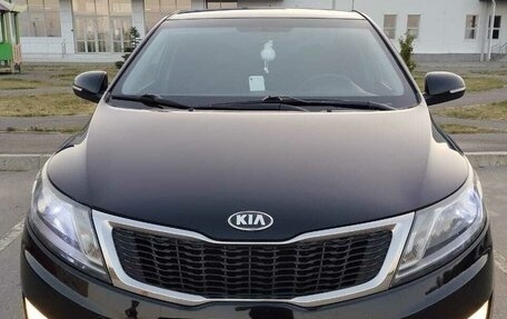 KIA Rio III рестайлинг, 2012 год, 890 000 рублей, 9 фотография