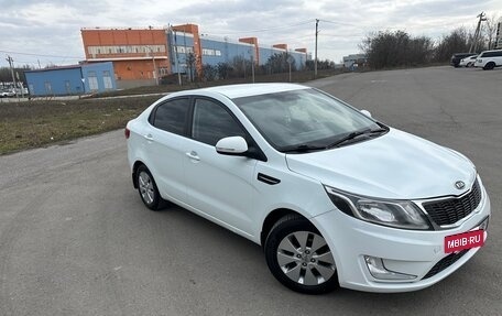 KIA Rio III рестайлинг, 2012 год, 850 000 рублей, 6 фотография