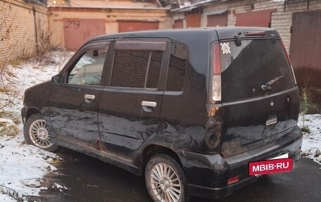 Nissan Cube II, 1999 год, 90 000 рублей, 10 фотография