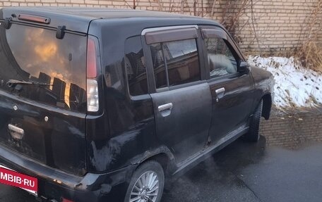 Nissan Cube II, 1999 год, 90 000 рублей, 5 фотография