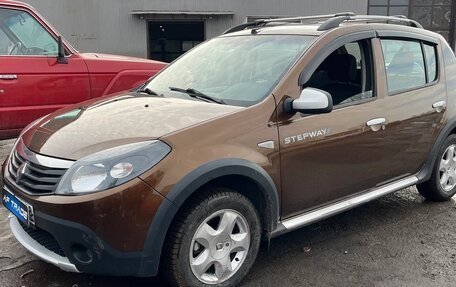 Renault Sandero I, 2013 год, 730 000 рублей, 2 фотография