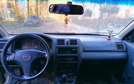 Mazda 323, 1999 год, 88 000 рублей, 10 фотография