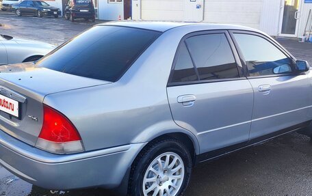 Ford Laser IV, 1999 год, 350 000 рублей, 3 фотография