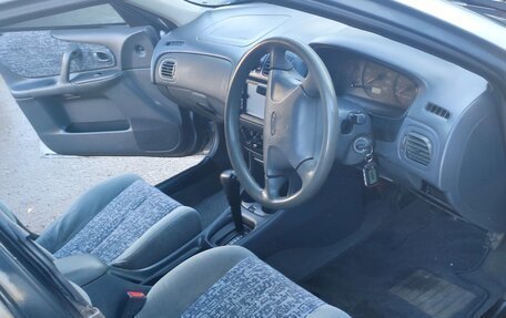 Ford Laser IV, 1999 год, 350 000 рублей, 6 фотография