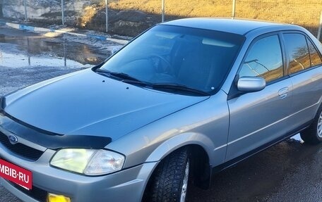 Ford Laser IV, 1999 год, 350 000 рублей, 2 фотография