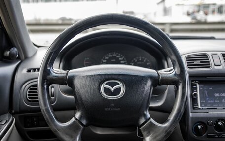 Mazda 323, 2001 год, 378 000 рублей, 31 фотография