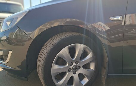 Opel Astra J, 2013 год, 13 фотография