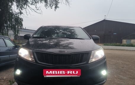 KIA Rio III рестайлинг, 2013 год, 1 000 000 рублей, 3 фотография