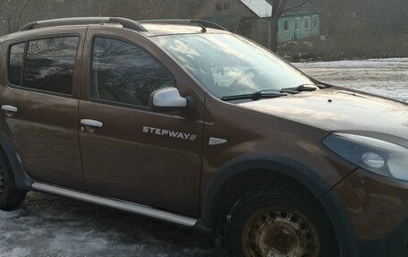 Renault Sandero I, 2013 год, 750 000 рублей, 2 фотография