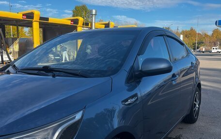 KIA Rio III рестайлинг, 2013 год, 680 000 рублей, 3 фотография