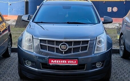 Cadillac SRX II рестайлинг, 2011 год, 1 100 000 рублей, 1 фотография